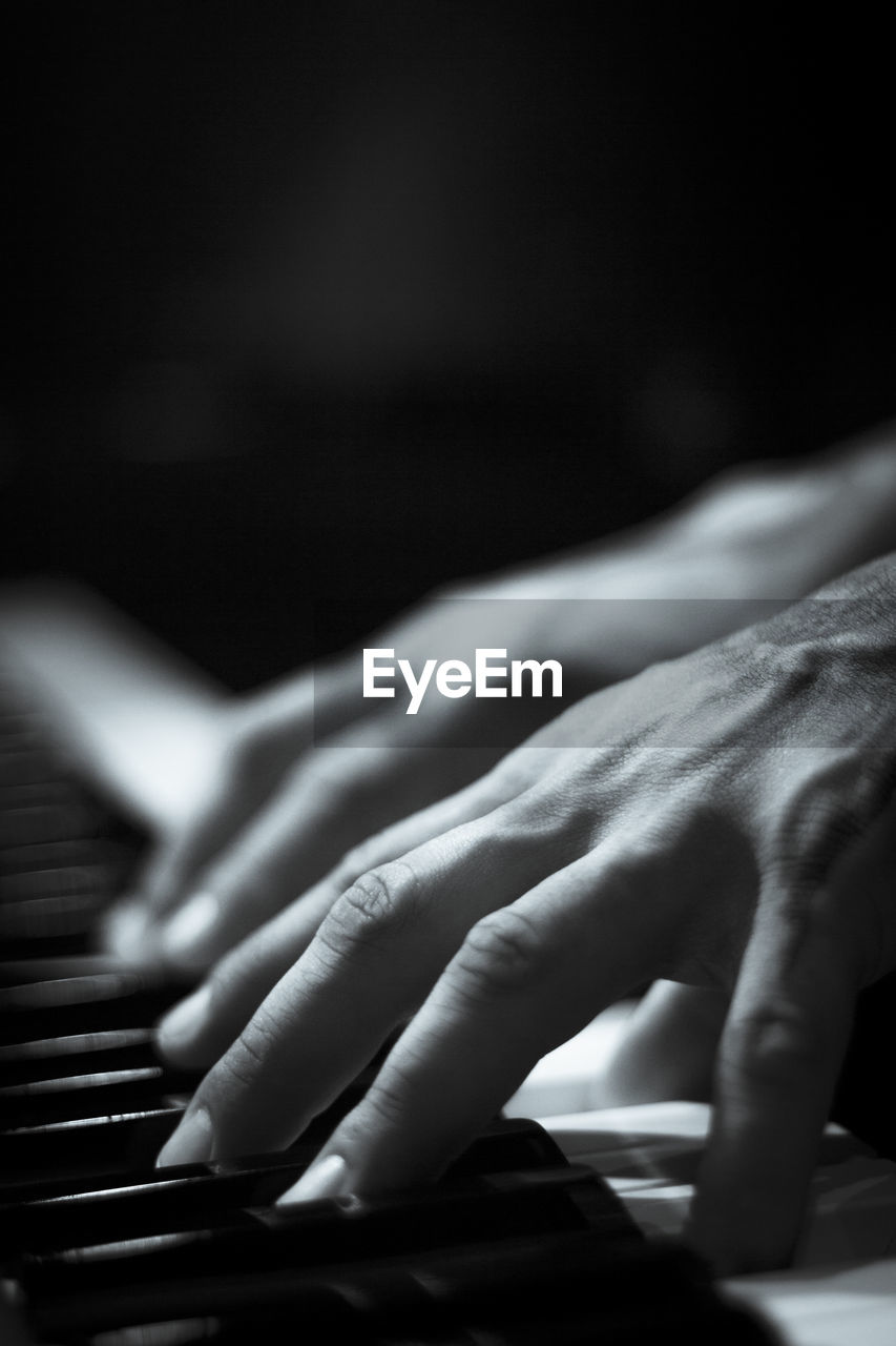 hand, pianist, piano, black and white, black, musical equipment, monochrome, music, musician, musical instrument, close-up, monochrome photography, arts culture and entertainment, piano key, finger, musical keyboard, white, adult, indoors, one person, string instrument, keyboard, skill, performance, person, electronic device, selective focus, lifestyles