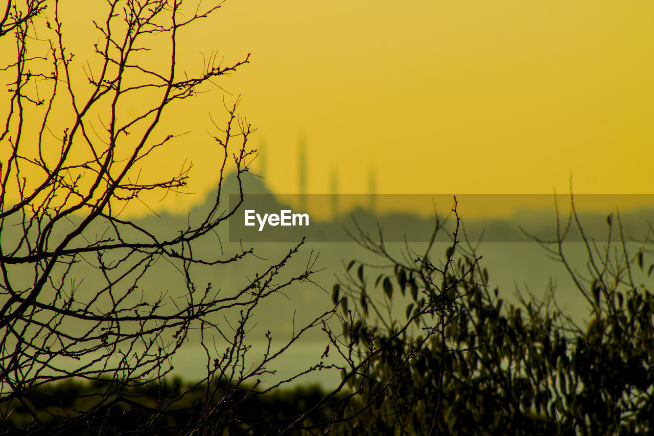 Silhouette of distant mosque