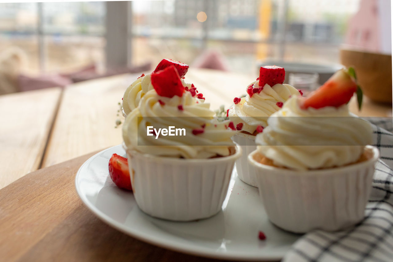 Close-up of cupcakes on table