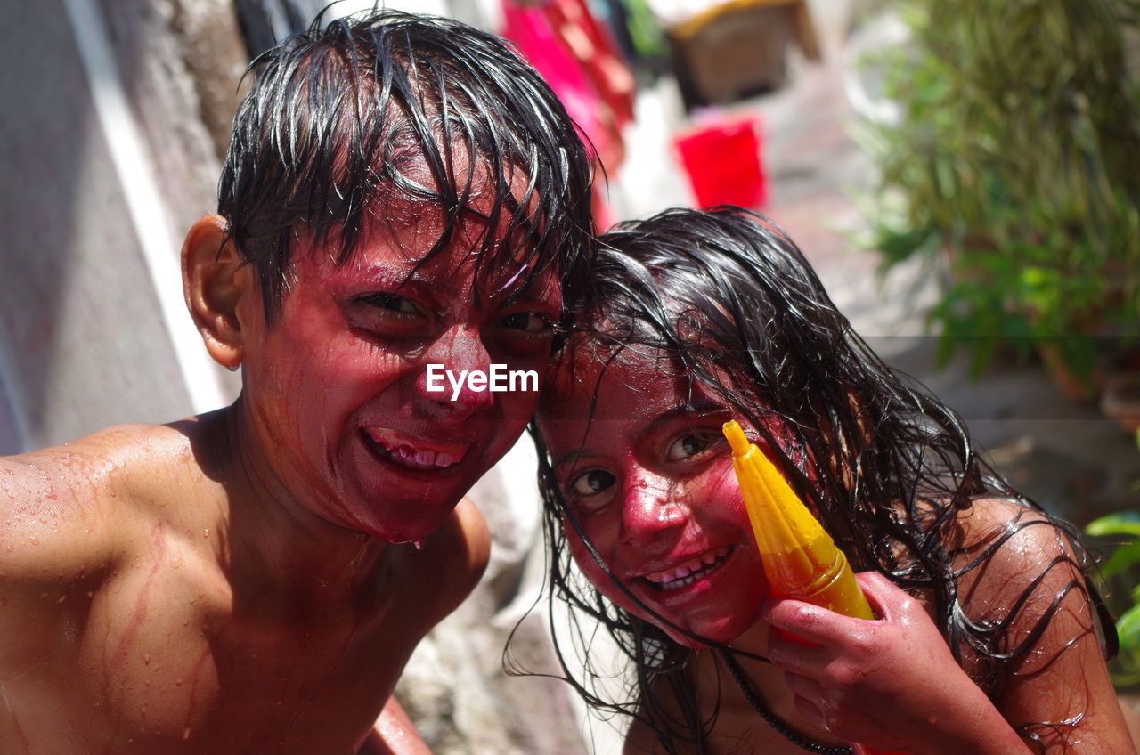 Portrait of children playing holi