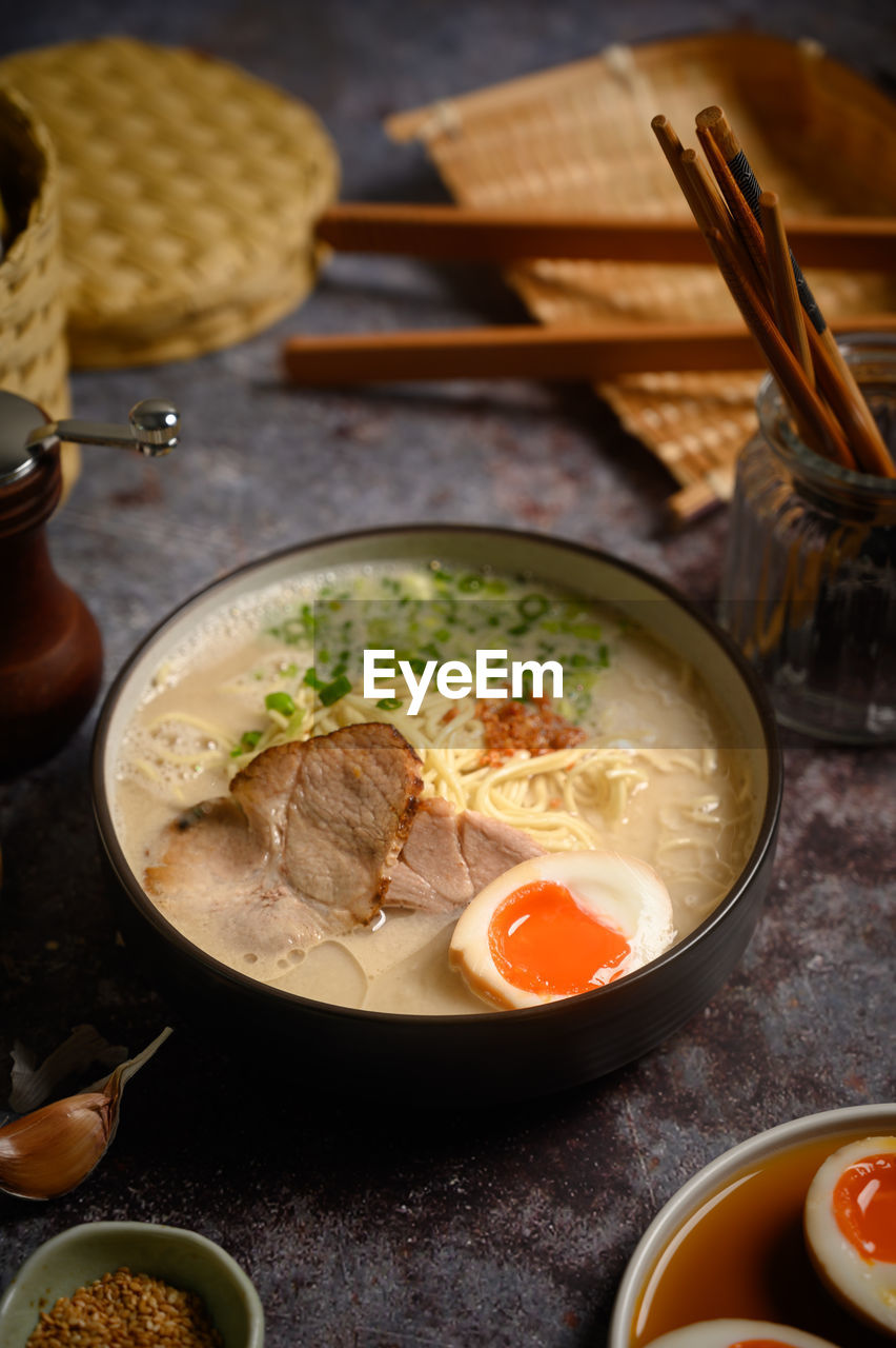 Close-up of ramen with soup served on table