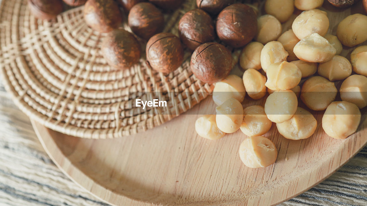 food, food and drink, freshness, healthy eating, wood, wellbeing, produce, still life, no people, close-up, large group of objects, indoors, basket, table, high angle view, nut, nuts & seeds, nut - food, abundance, vegetable, plant, fruit, brown