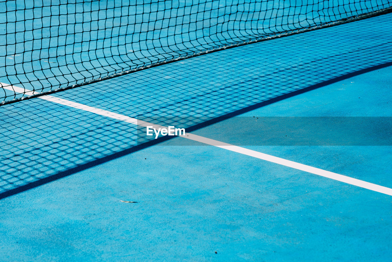 net, sports, blue, net - sports equipment, day, tennis net, line, no people, tennis, swimming pool, tennis court, absence, pattern, outdoors, high angle view, nature, backgrounds, floor, full frame, flooring