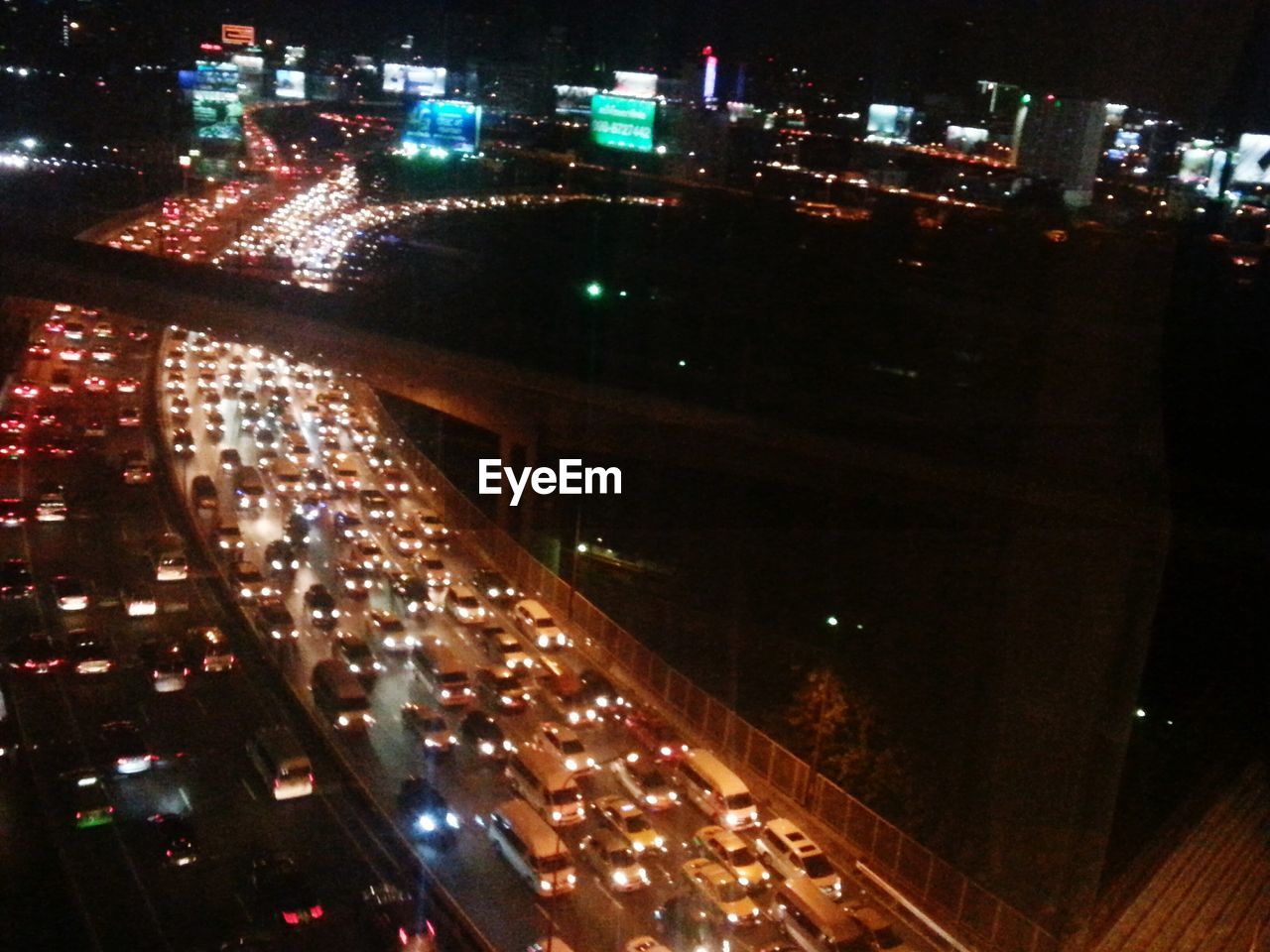 TRAFFIC ON CITY STREET AT NIGHT