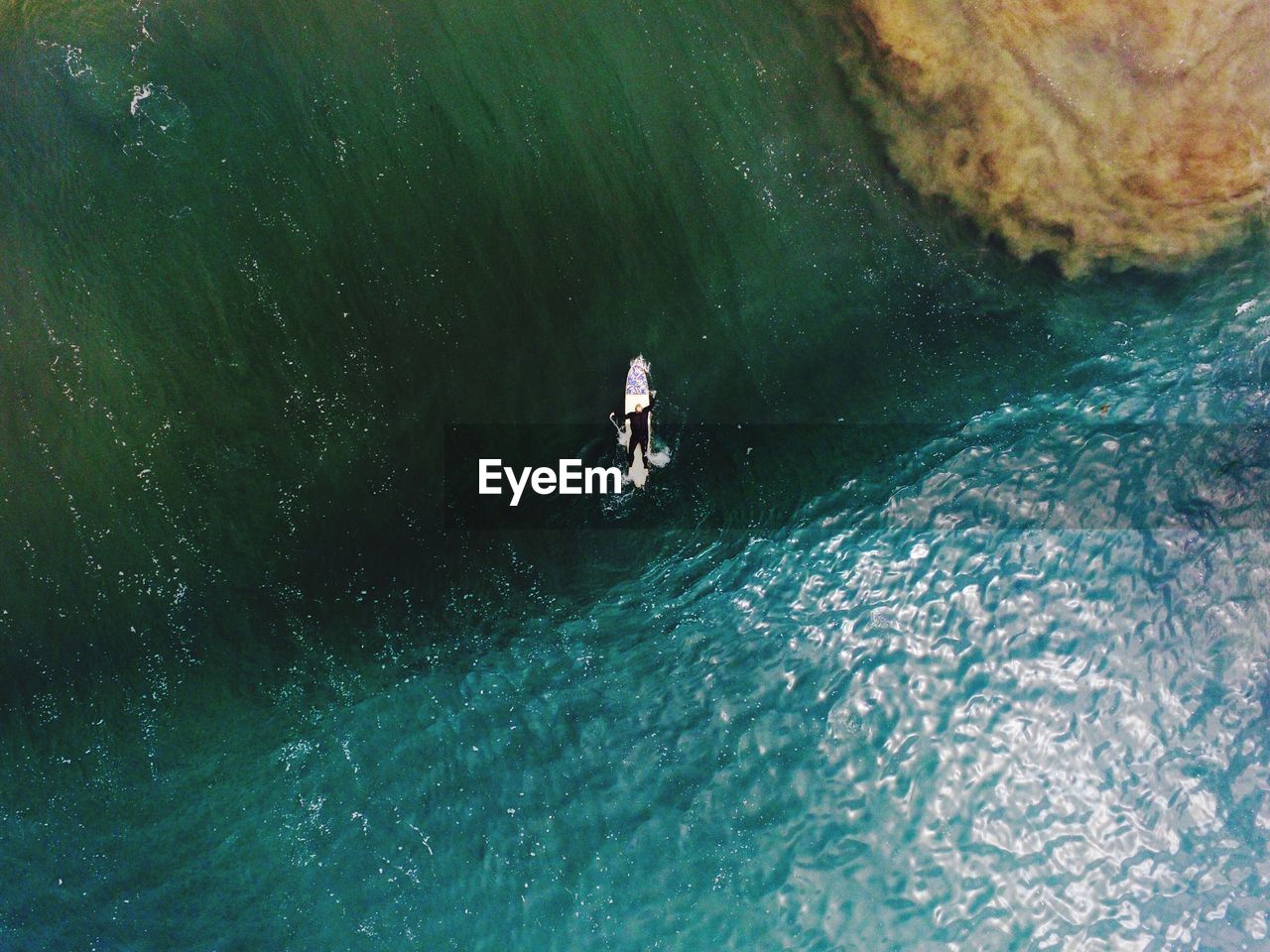 Aerial view of surfer in water