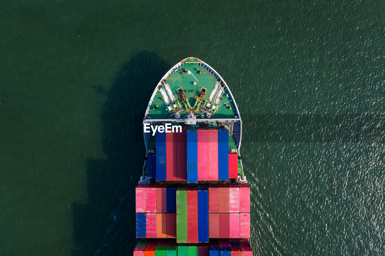 High angle view shipping container sailing on the sea 