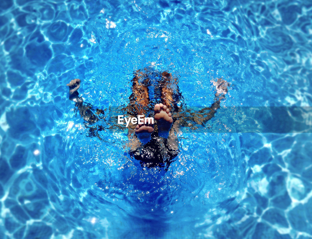 High angle view of man in swimming pool