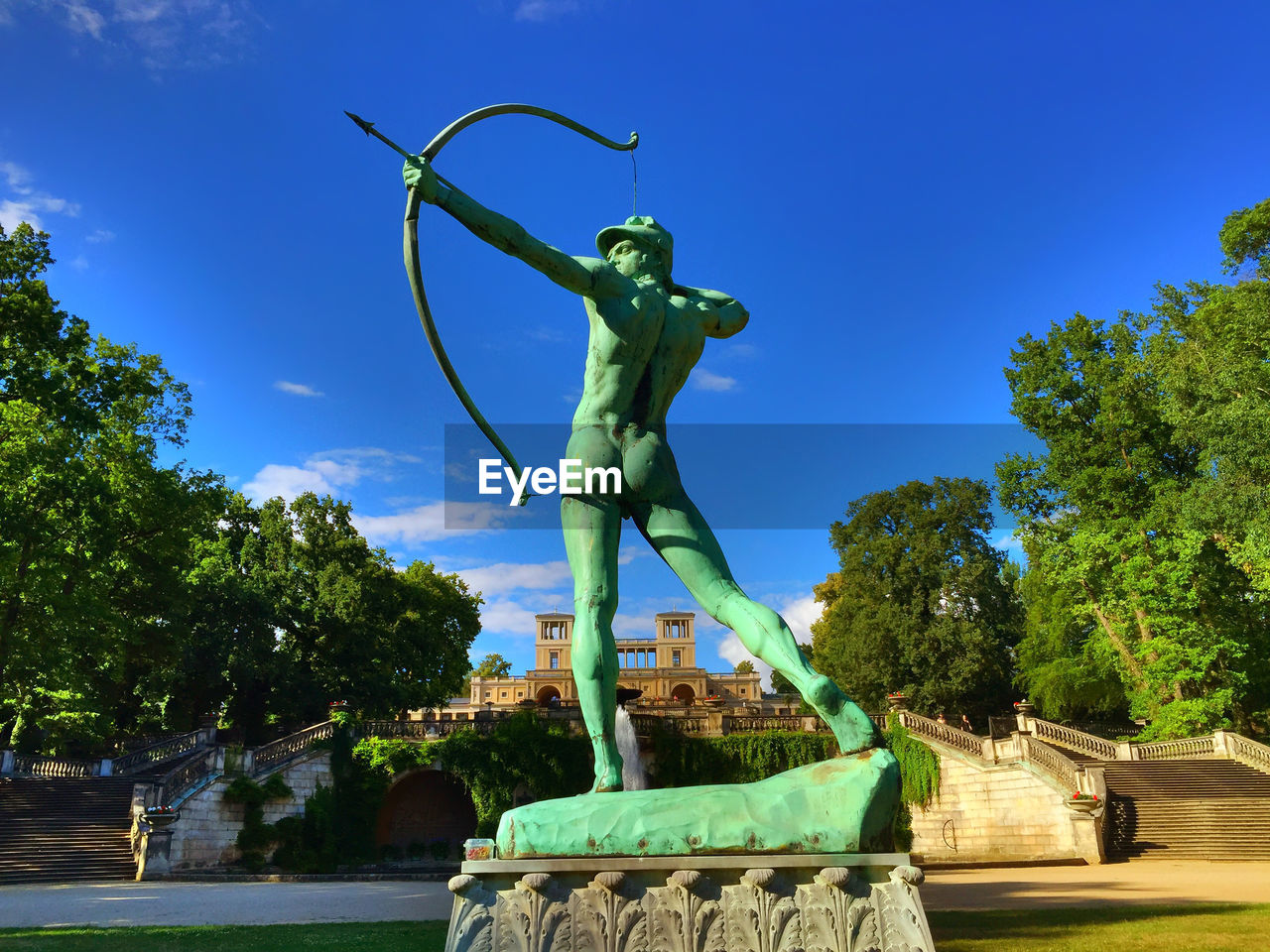 STATUE AGAINST SKY