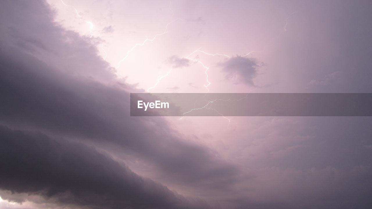 Low angle view of lightning in dramatic sky