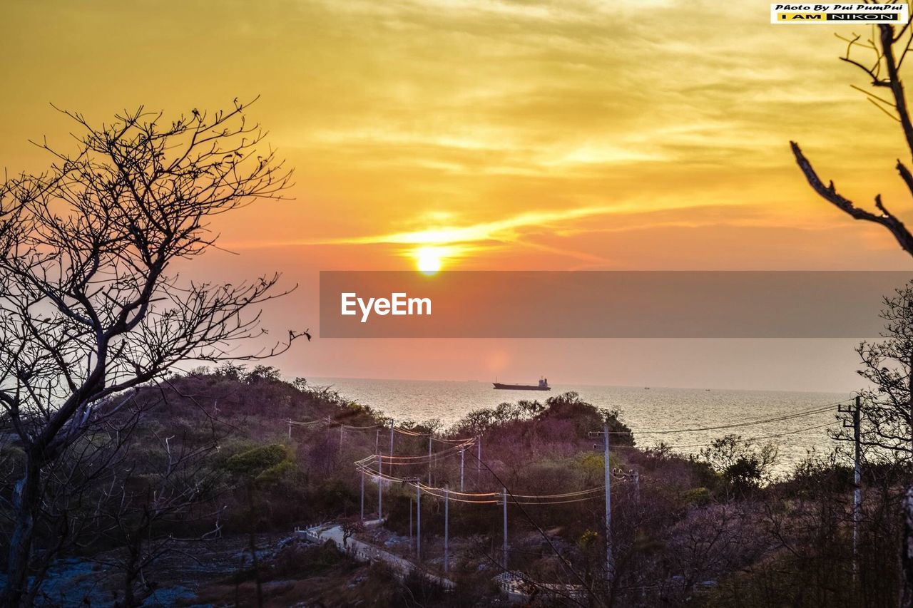 SCENIC VIEW OF SEA DURING SUNSET