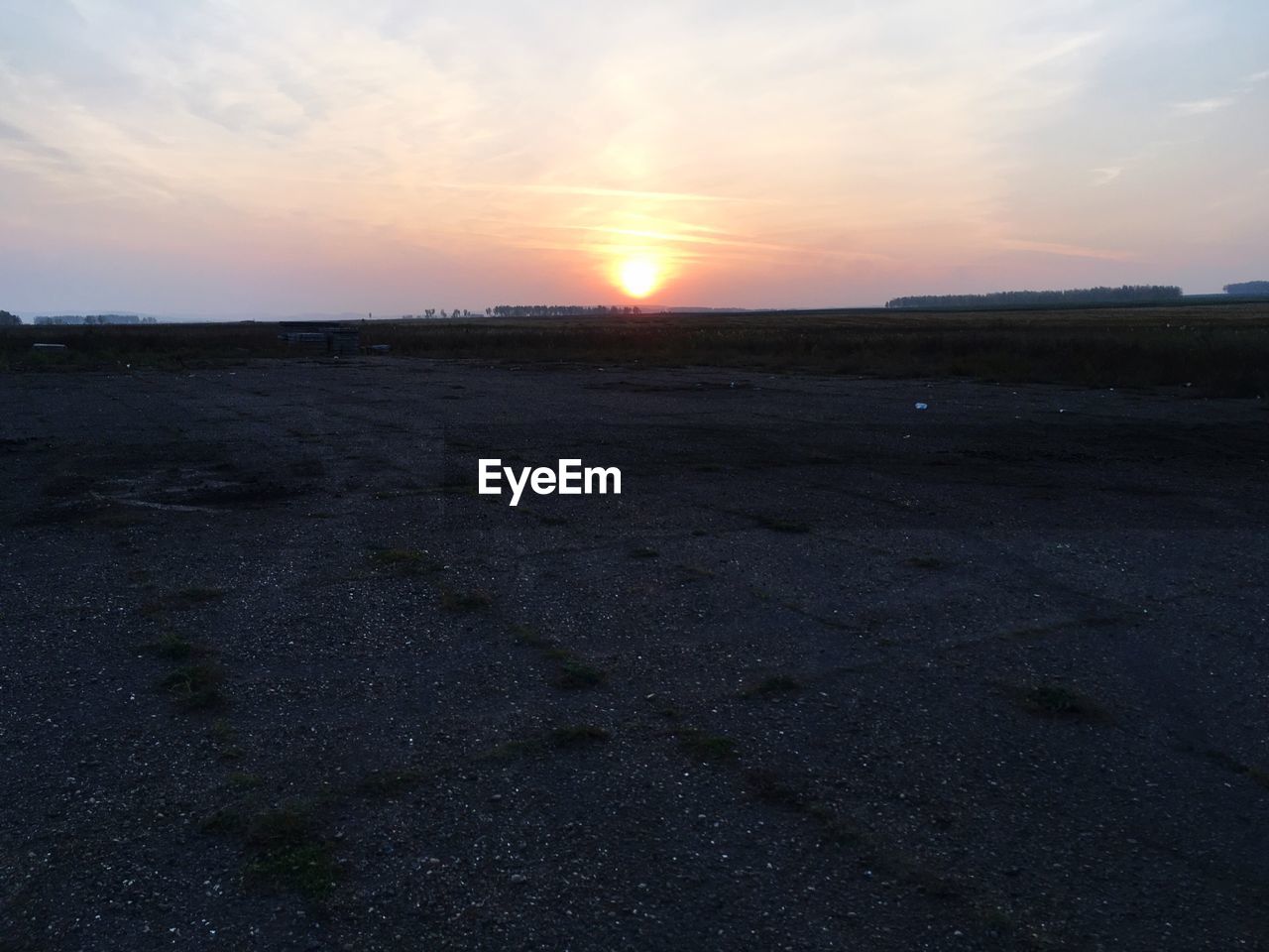 SCENIC VIEW OF SEA AGAINST SKY AT SUNSET