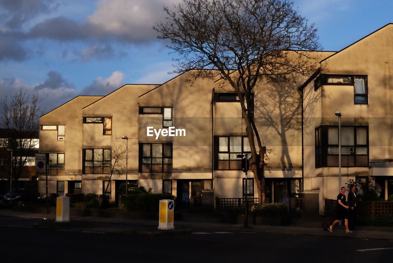 HOUSES AGAINST SKY