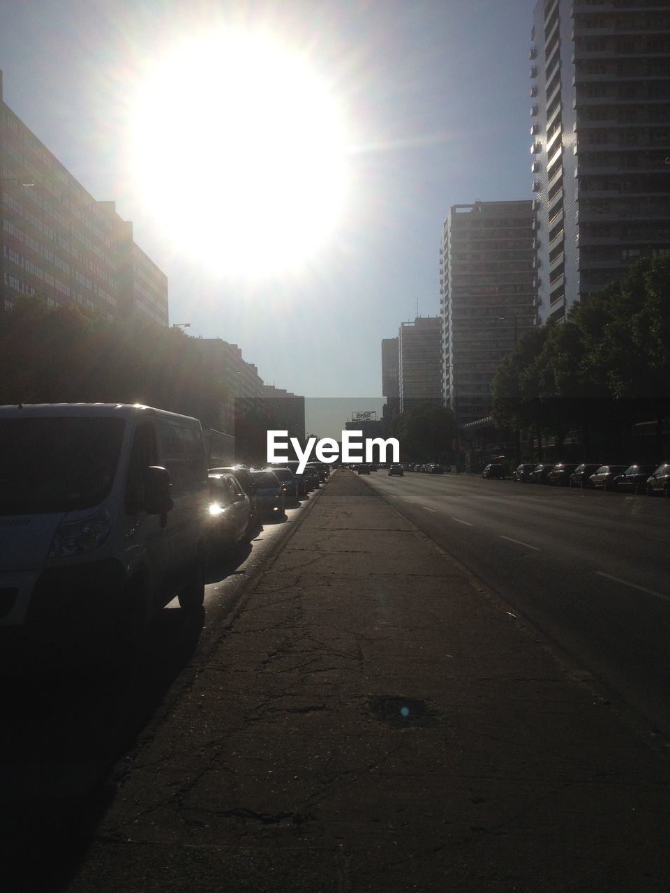 VIEW OF CITY STREET DURING SUNSET