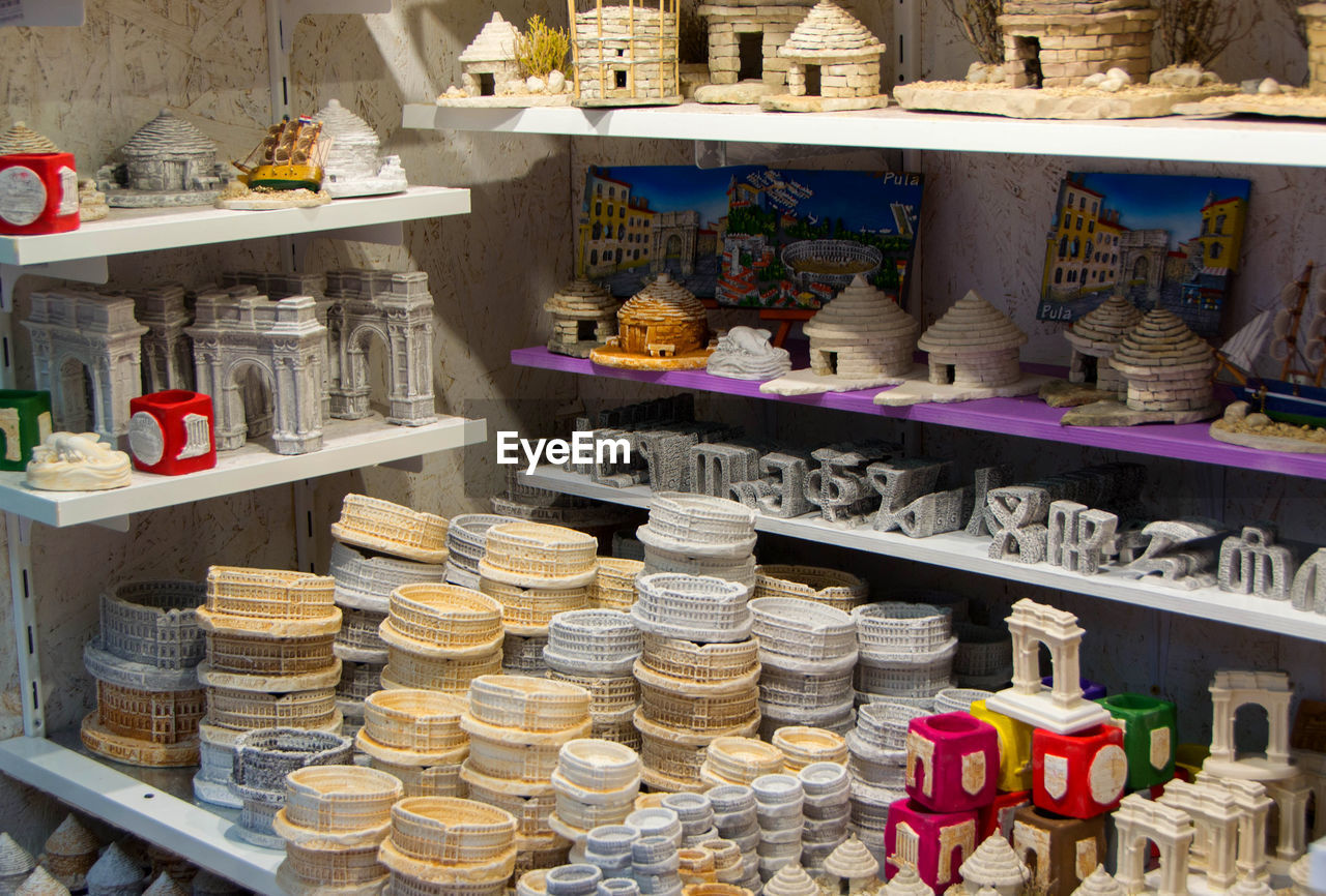 Various souvenir displayed for sale in store