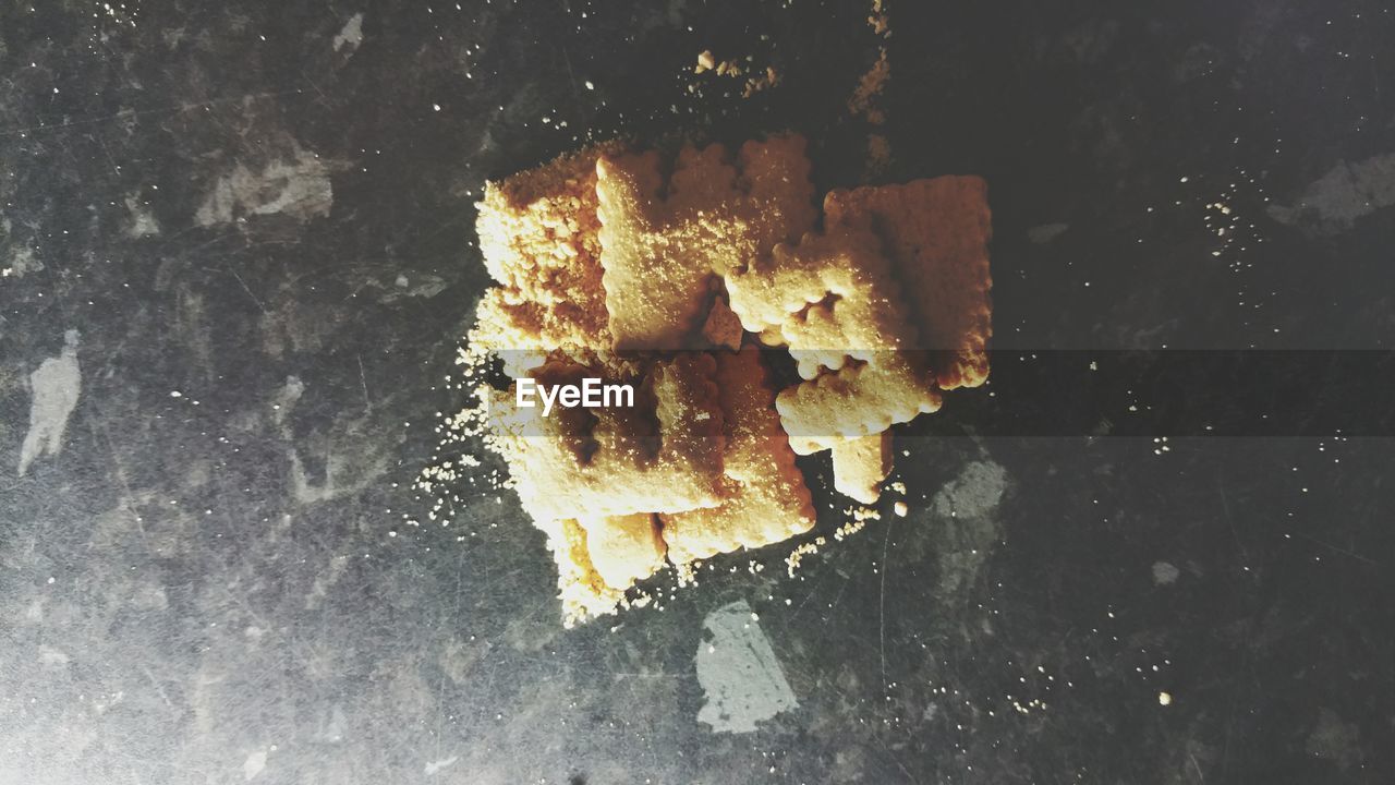 High angle view of alphabet biscuits on table