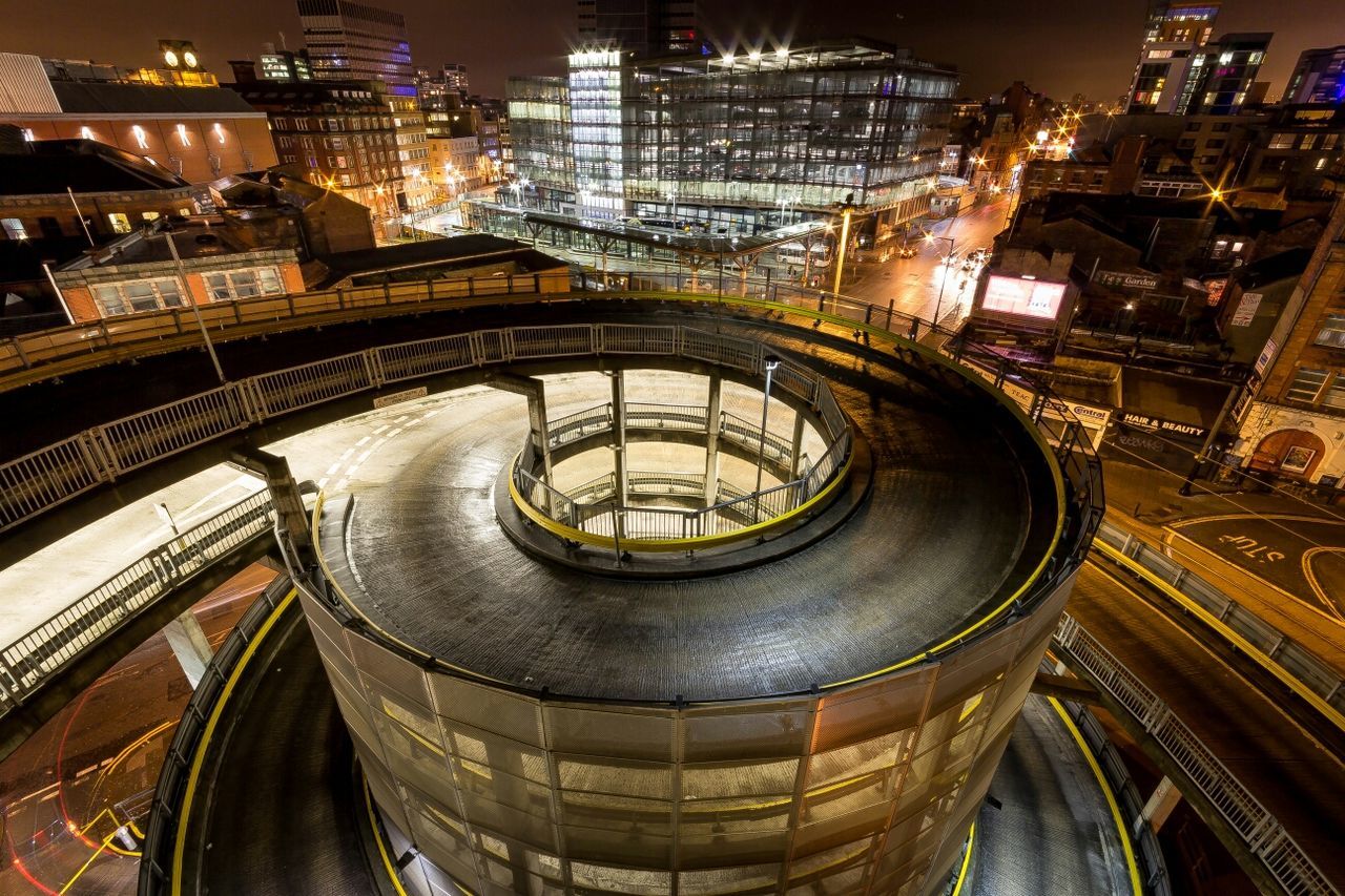 High angle view of parking lot in city at night