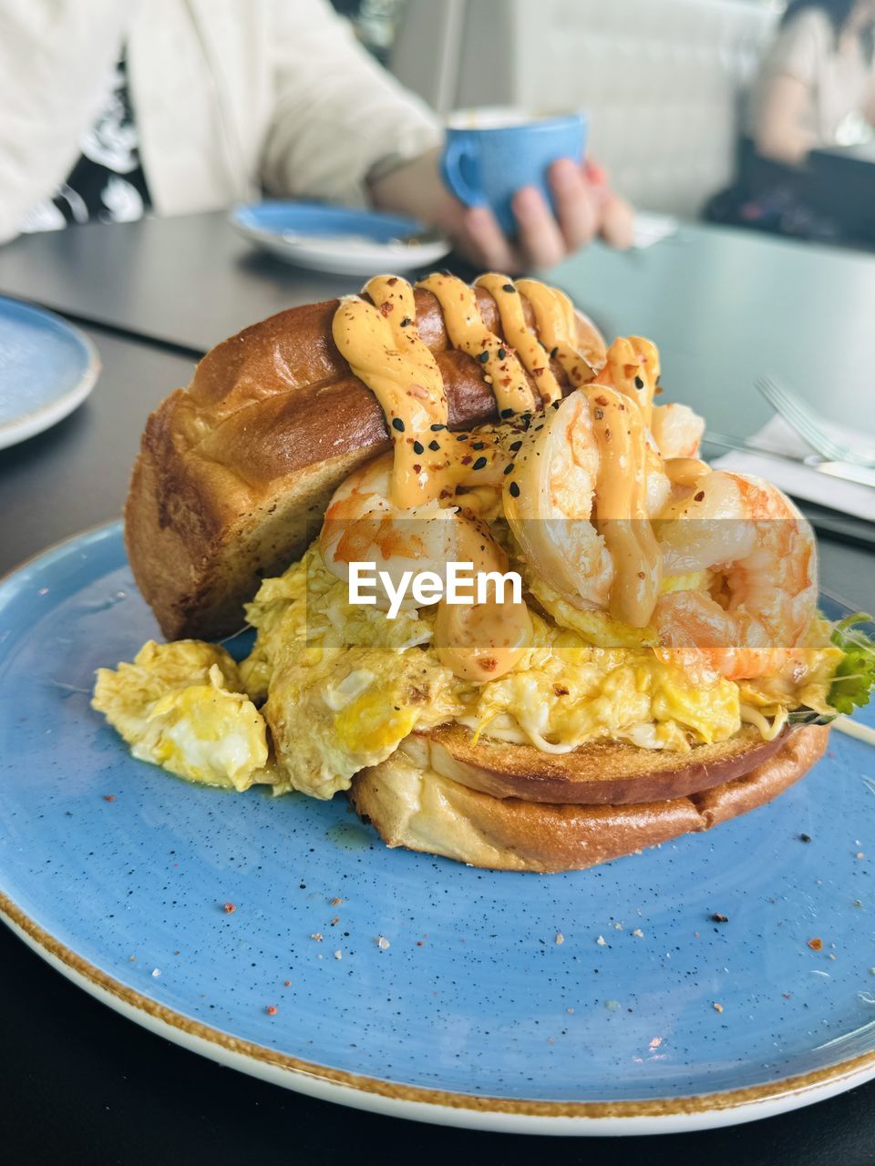 food and drink, food, plate, dish, meal, breakfast, freshness, healthy eating, cuisine, indoors, table, produce, meat, fast food, brunch, business, wellbeing, adult, seafood, dinner, restaurant, bread, baked, close-up, vegetable