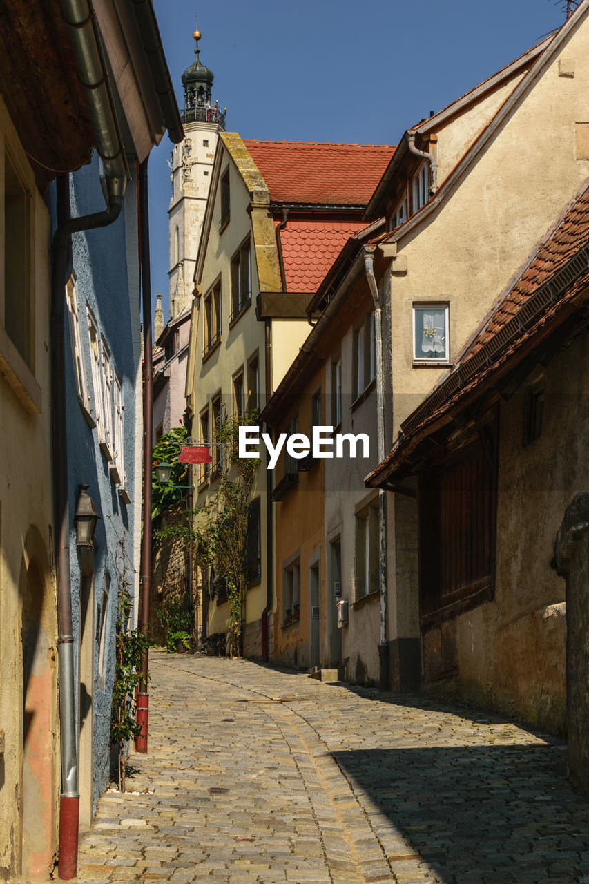 STREET AMIDST BUILDINGS IN TOWN