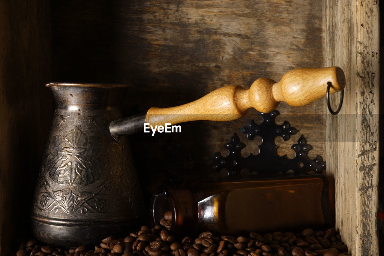 Close-up of coffee beans on table