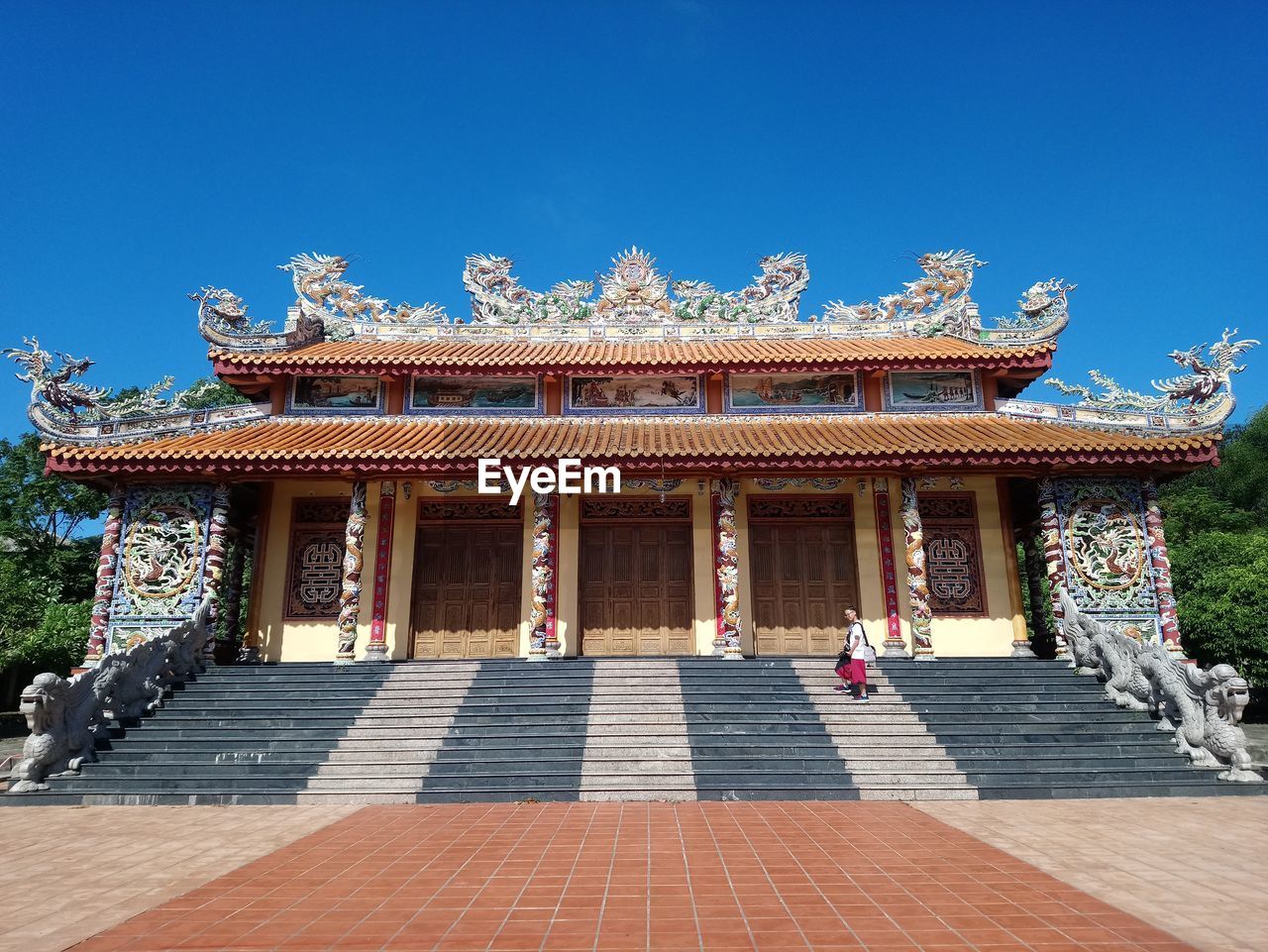 VIEW OF TEMPLE AGAINST BUILDING