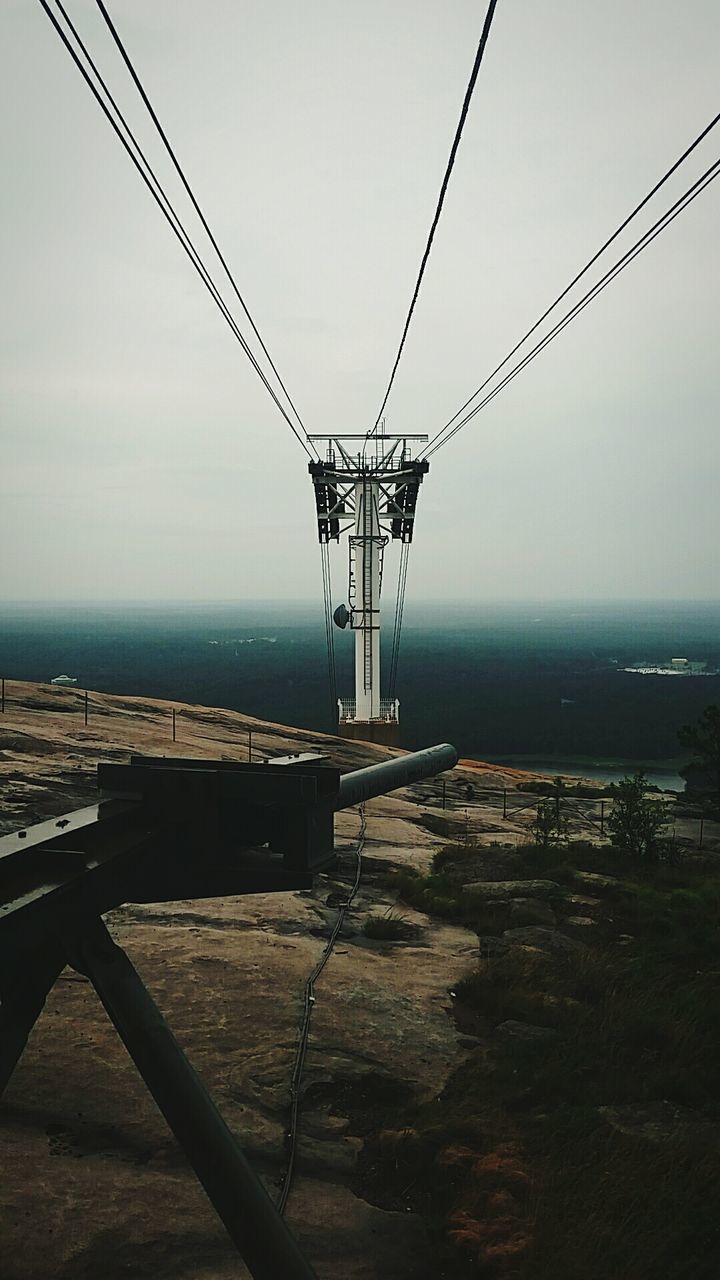 cable, sky, sea, water, nature, electricity, no people, architecture, technology, transportation, built structure, mast, scenics - nature, outdoors, day, reflection, vehicle, horizon, tower, power generation, environment, power supply, horizon over water, beauty in nature, wind, land, tranquility