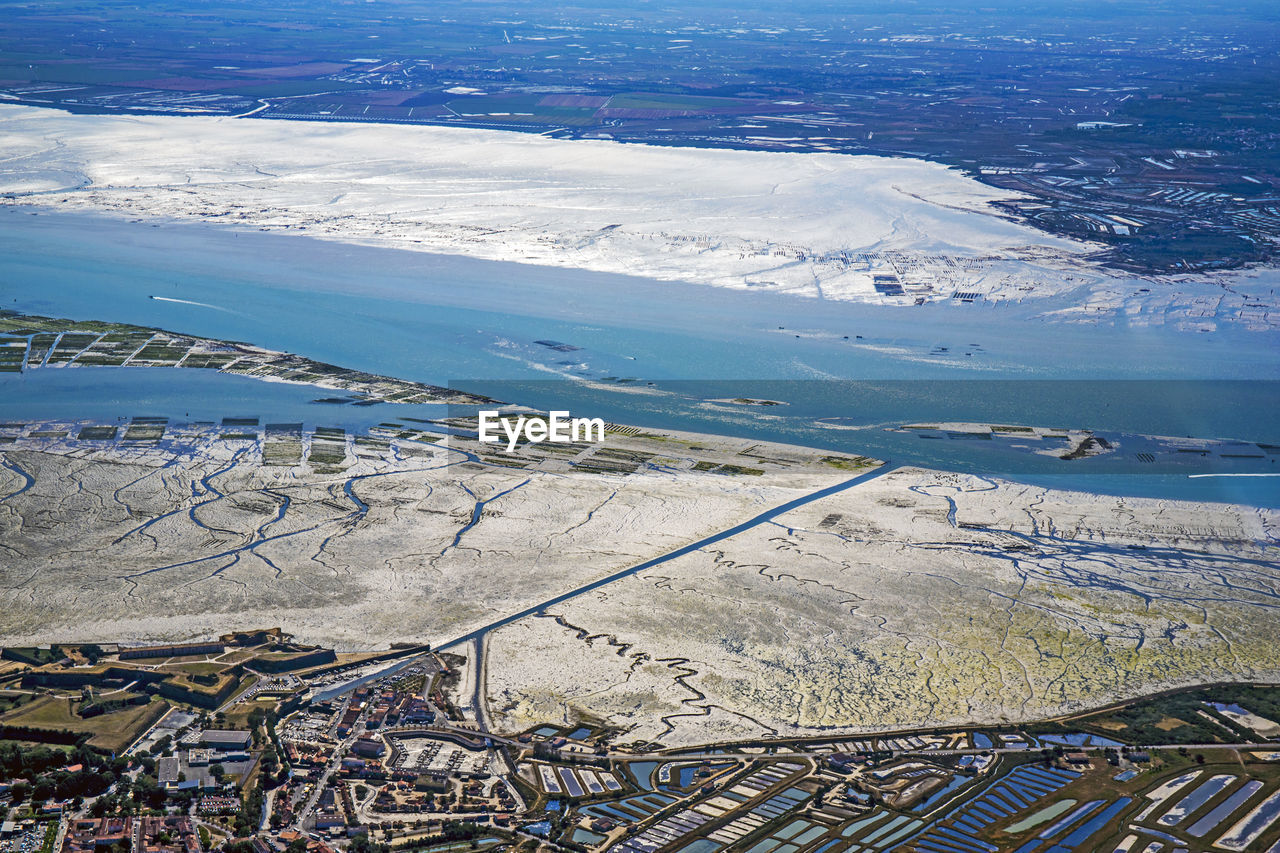 HIGH ANGLE VIEW OF SNOW ON LAND