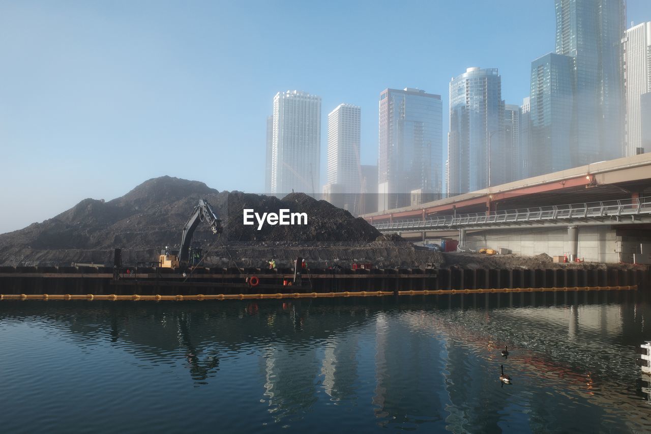 REFLECTION OF BUILDINGS ON WATER