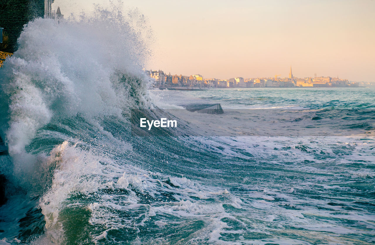 Big wave crushing, high tide in saint-malo , brittany, france