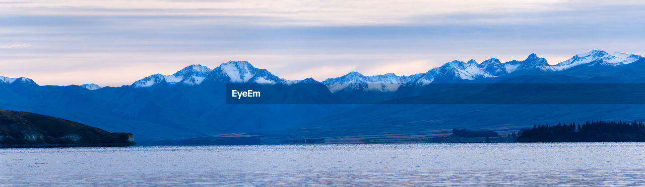 SCENIC VIEW OF SNOWCAPPED MOUNTAIN AGAINST SKY