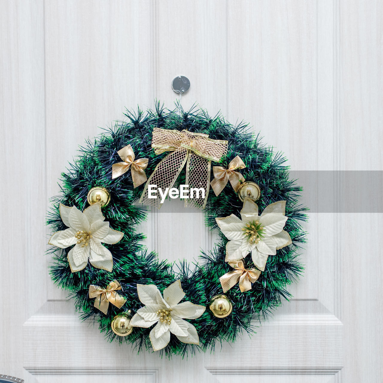 christmas decoration, wreath, decoration, celebration, holiday, interior design, christmas, no people, plant, indoors, tradition, nature, shape, christmas tree, wood, christmas ornament, hanging, flower, white, wall - building feature