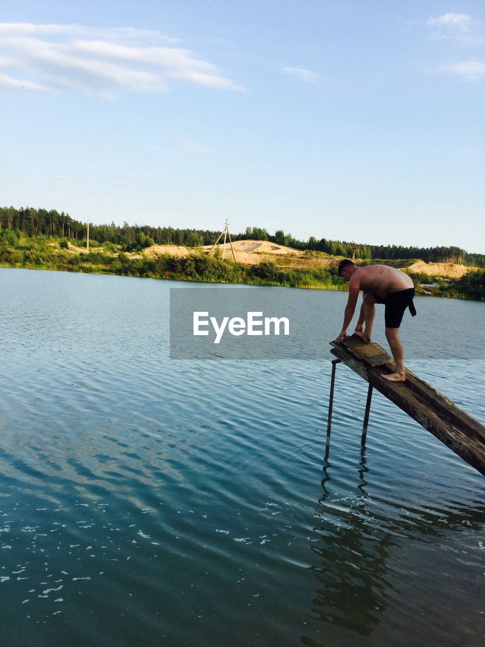 Man on diving platform