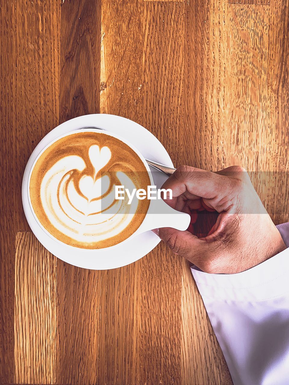 High angle view of coffee cup on table