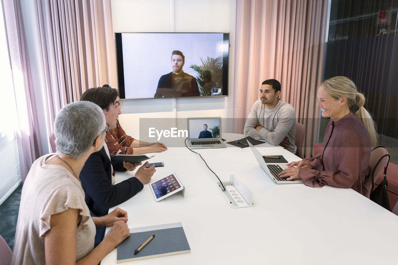 People during video conference