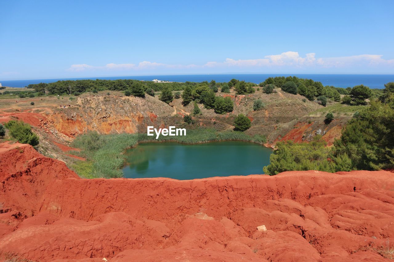 SCENIC VIEW OF LANDSCAPE AGAINST BLUE SKY