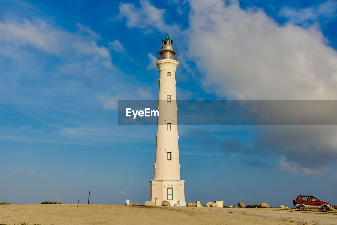 VIEW OF LIGHTHOUSE AGAINST BLUE SKY