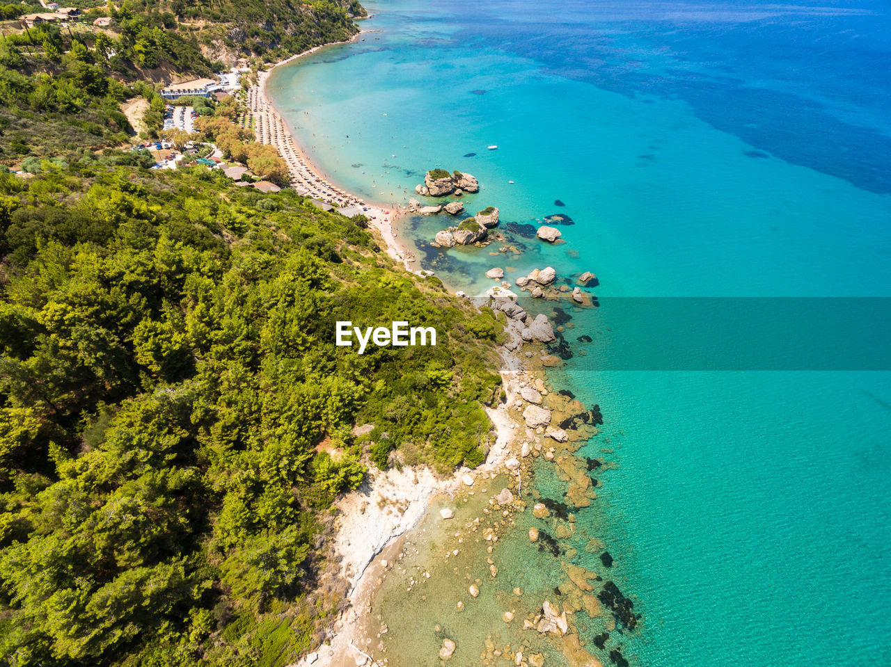 Aerial view of sea and landscape against sky