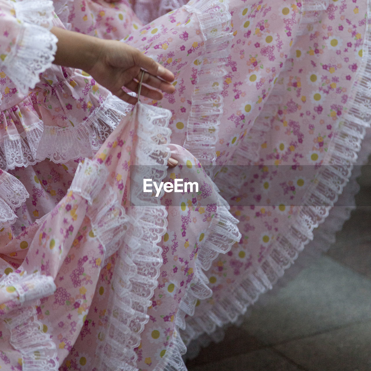 Midsection of woman in traditional clothing