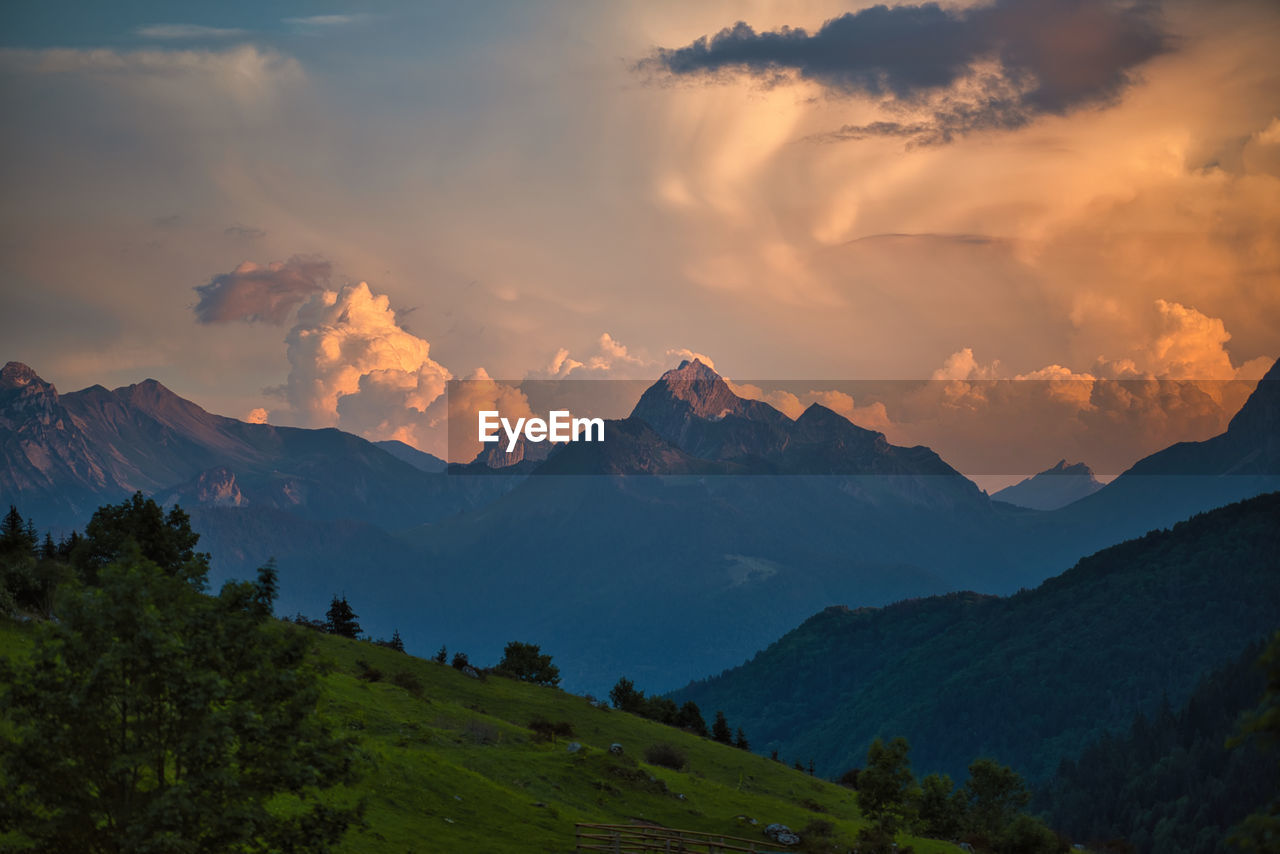 Scenic view of mountains against sky during sunset