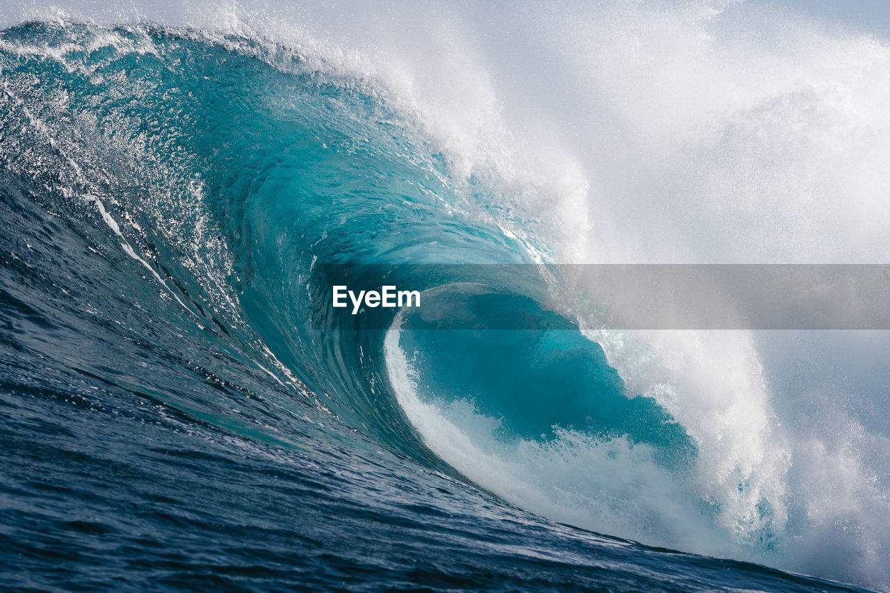 Clean and powerful wave breaking on a beach in canary islands