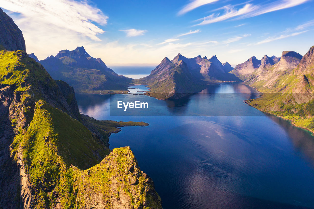 panoramic view of sea and mountains against sky