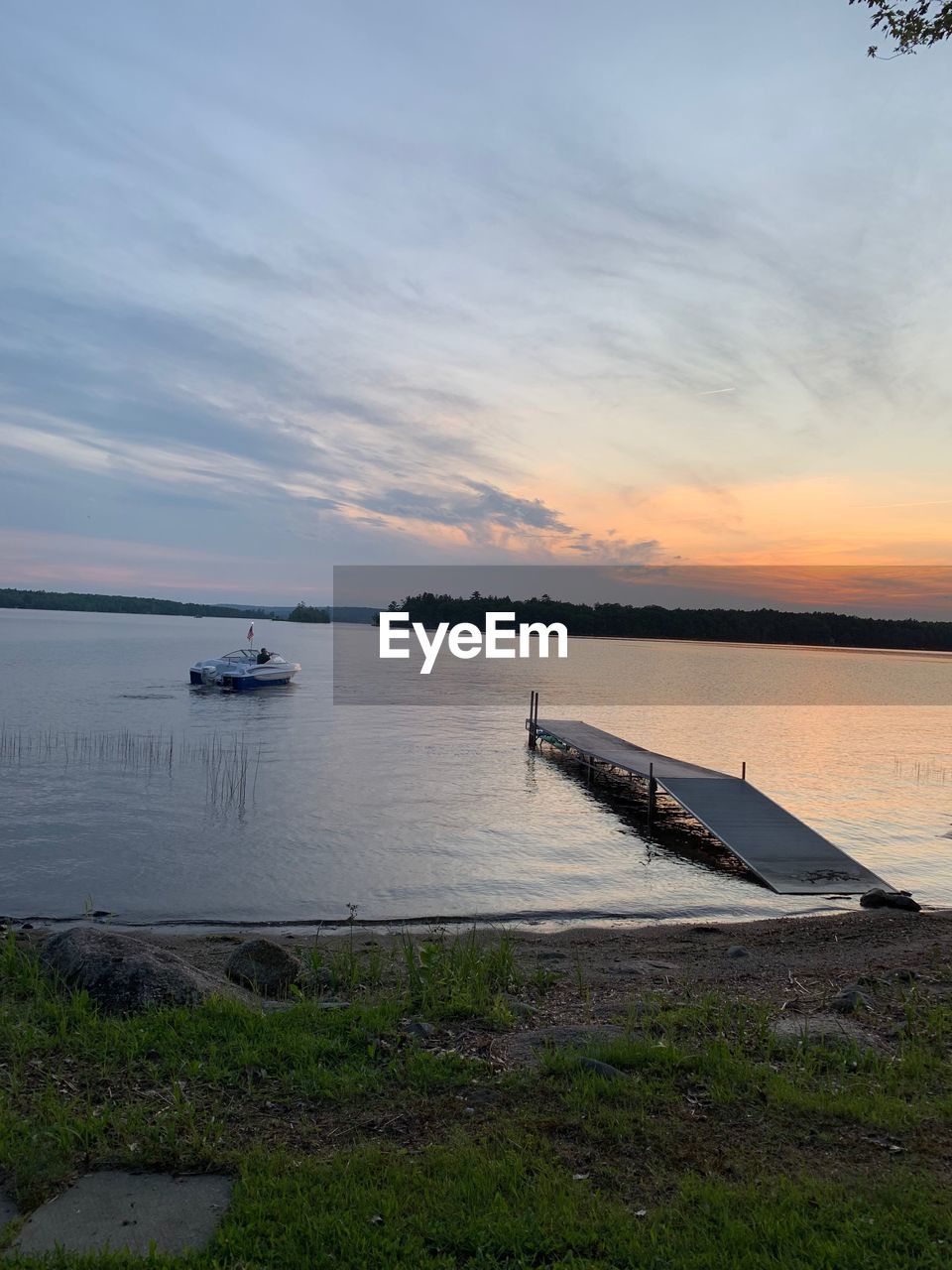 SCENIC VIEW OF SEA DURING SUNSET