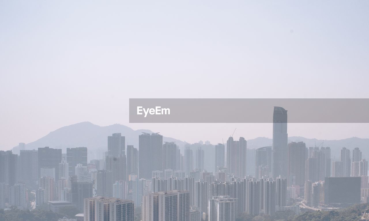 Cityscape against clear sky