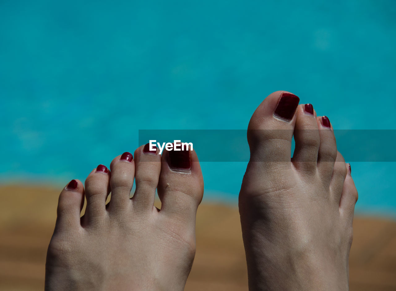 Close-up of toes with nail varnish