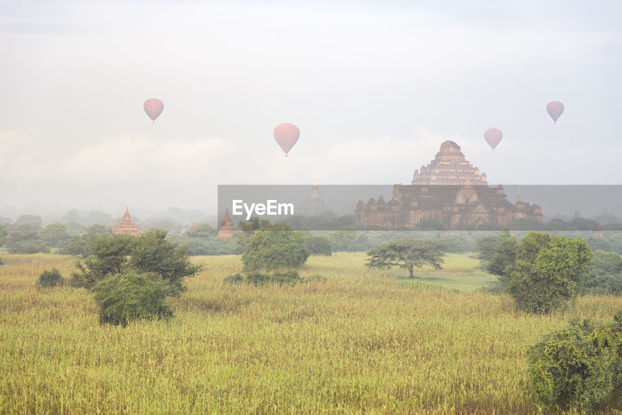 Hot-air balloons flying over dhammayangyi temple (bagan)