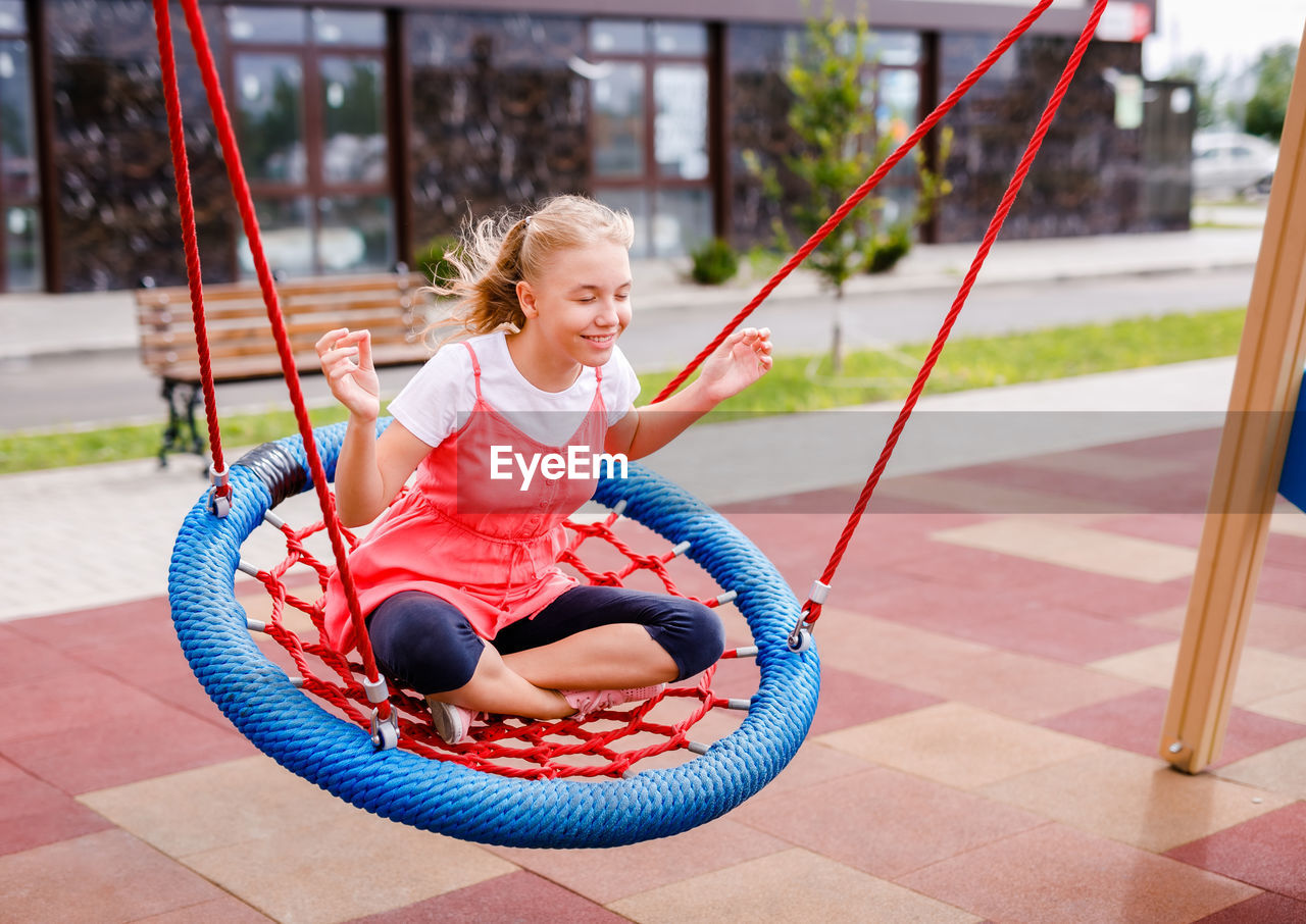 Girl playing in playground