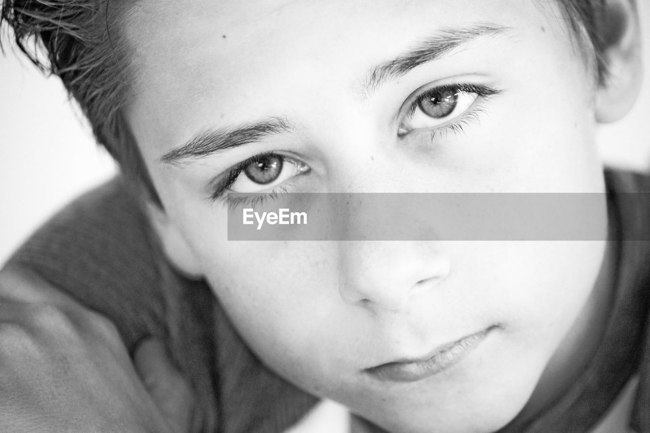 CLOSE-UP PORTRAIT OF BOY WITH EYES