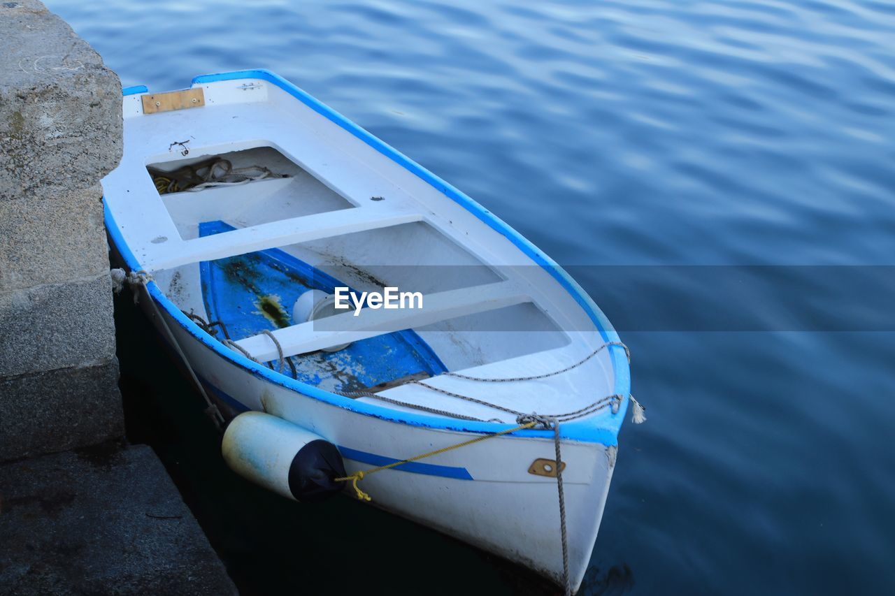 High angle view of boat moored on beach