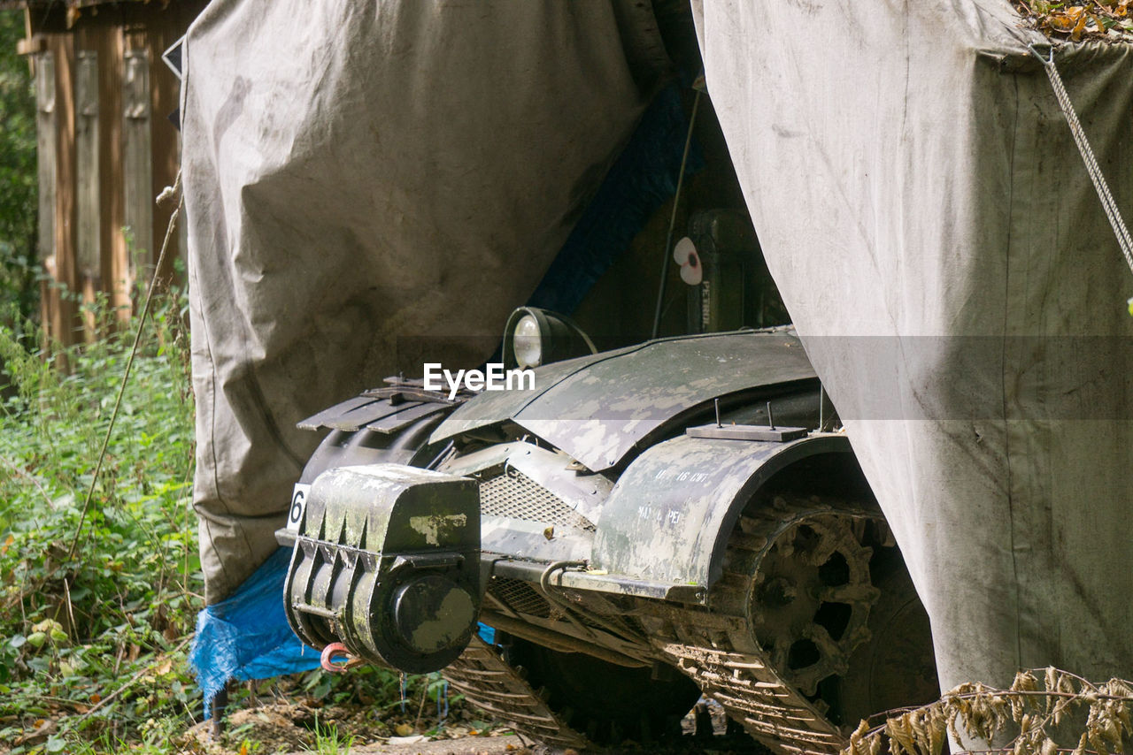 DAMAGED CAR IN ABANDONED BUILDING