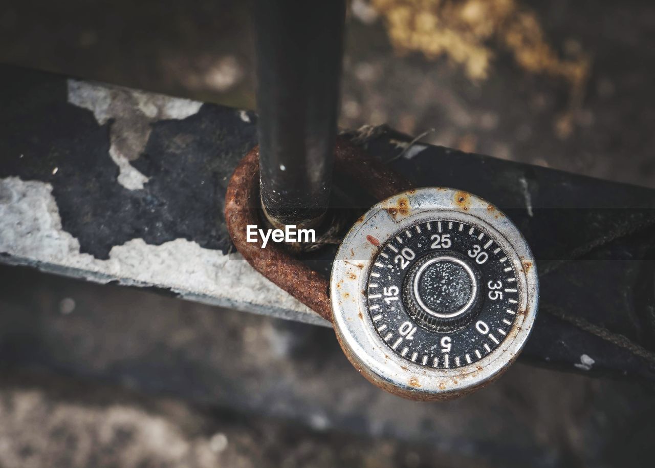 High angle view of padlock on metal