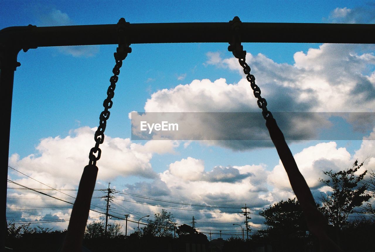 LOW ANGLE VIEW OF CHAIN AGAINST SKY